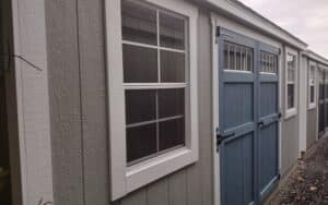 10' x 16' Keystone Cape T1-11 shed blue door
