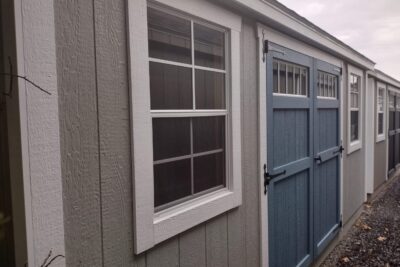 10' x 16' Keystone Cape T1-11 shed blue door
