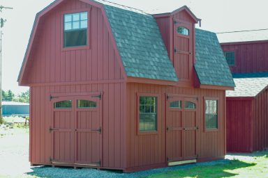 red 2 story storage shed