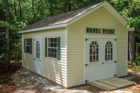new england ranch shed with fiberglass doors